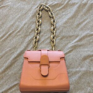 Elegant Coral Handbag with Chain Strap